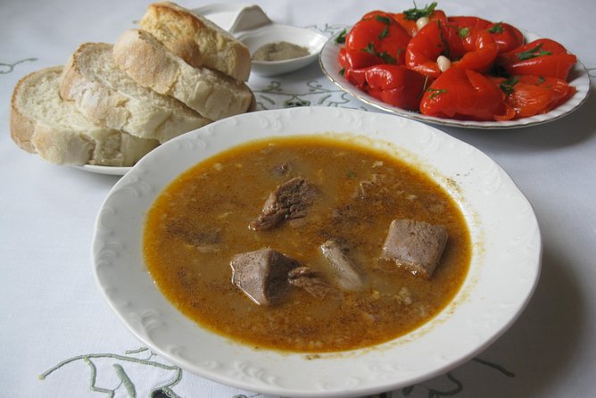 Best of Local Food & City Tour of Tirana - Food & Drinks Included - Dëshmorët e Kombit Boulevard and communist-era Tirana