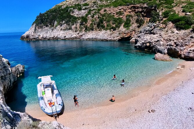 Private Full Day Boat Expedition to Grama Bay - Llovizi Bay and the Blue Seal Monk Cave