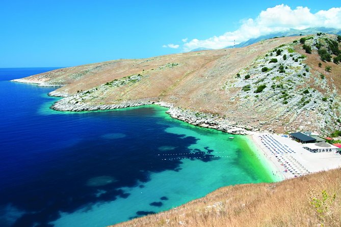Riviera Tour Borsh-Qeparo-Himare-Porto Palermo-Vuno-Dhermi - Dhërmi mixes mountain views with modern beach life