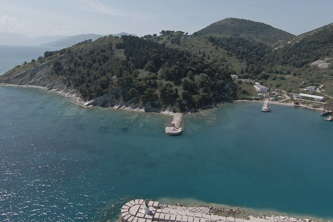 Snorkeling Expedition to Grama Bay,Smugglers Canyon & Blue Cave - Haxhi Ali Cave starts the adventure