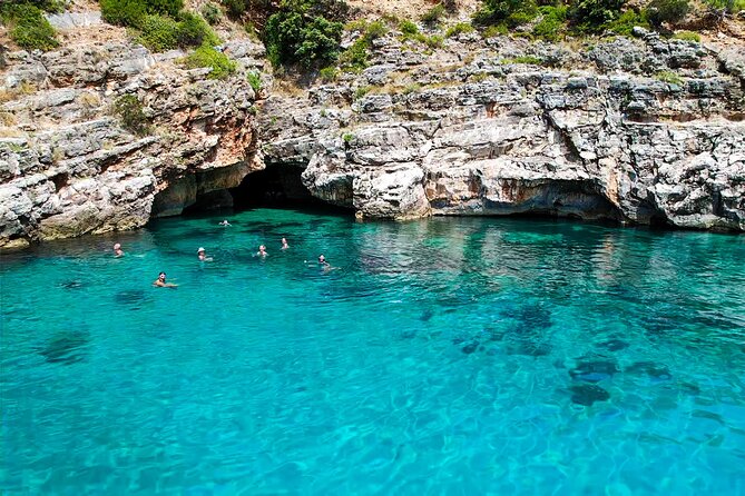 Vlore Private Boat Tour Blue Cave & Grama Bay Adventure - Smuggler’s Canyon brings narrow passages and sea caves